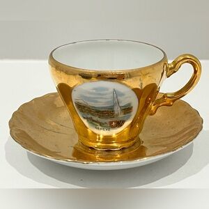 5/15$ Cotfer Switzerland Gold Mini Teacup and Saucer